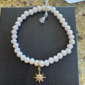 Elegant Gold and White Beaded Bracelet with Star Charm
